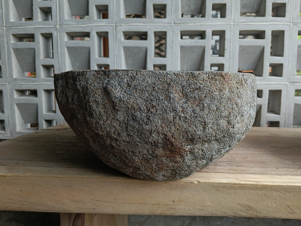 Left side of 6703-4937 river stone vessel sink in gray-brown natural stone

