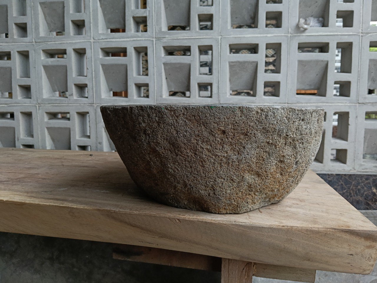 Left side of 6757-4436 river stone vessel sink in gray-brown natural stone

