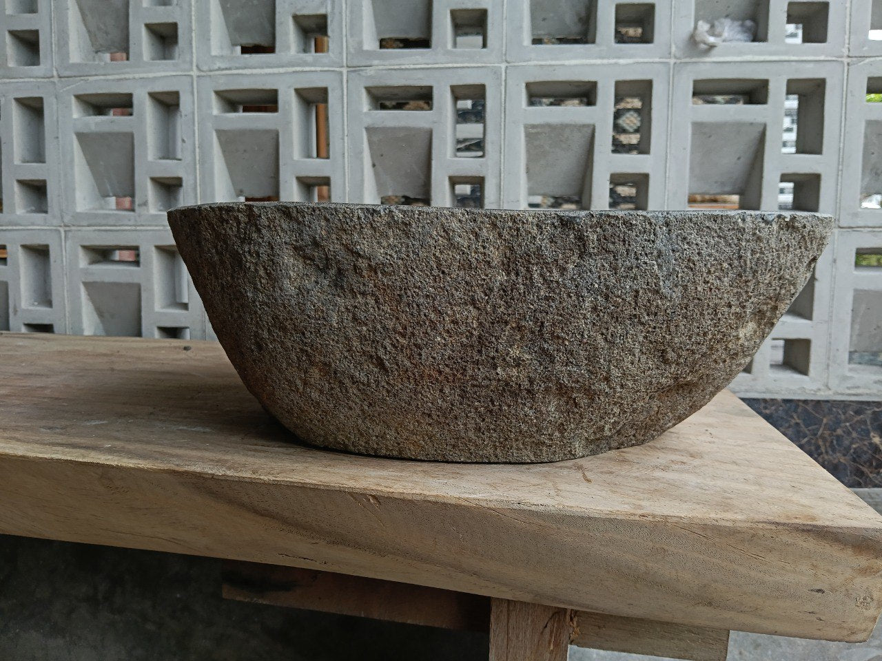 Back view of 6757-4436 handcrafted stone bathroom basin with raw textured exterior

