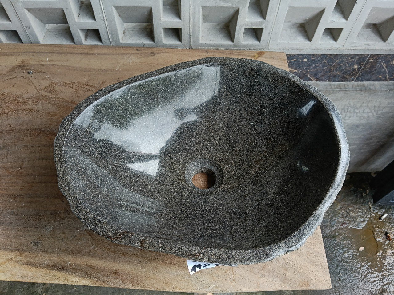 Top view of 6757-4436 deep graphite river stone sink, polished oval interior
