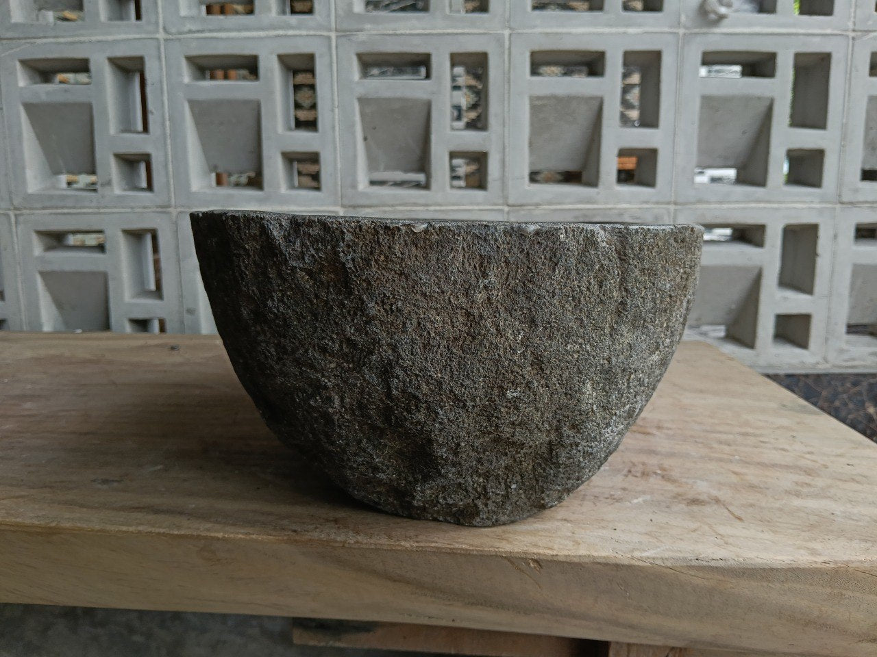 Right side of 6767-4029 organic natural stone sink, polished bowl and rustic exterior
