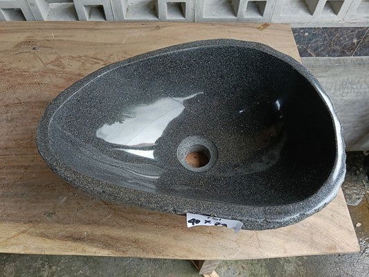 Top view of 6761-4029 deep graphite river stone sink, polished tear-drop interior
