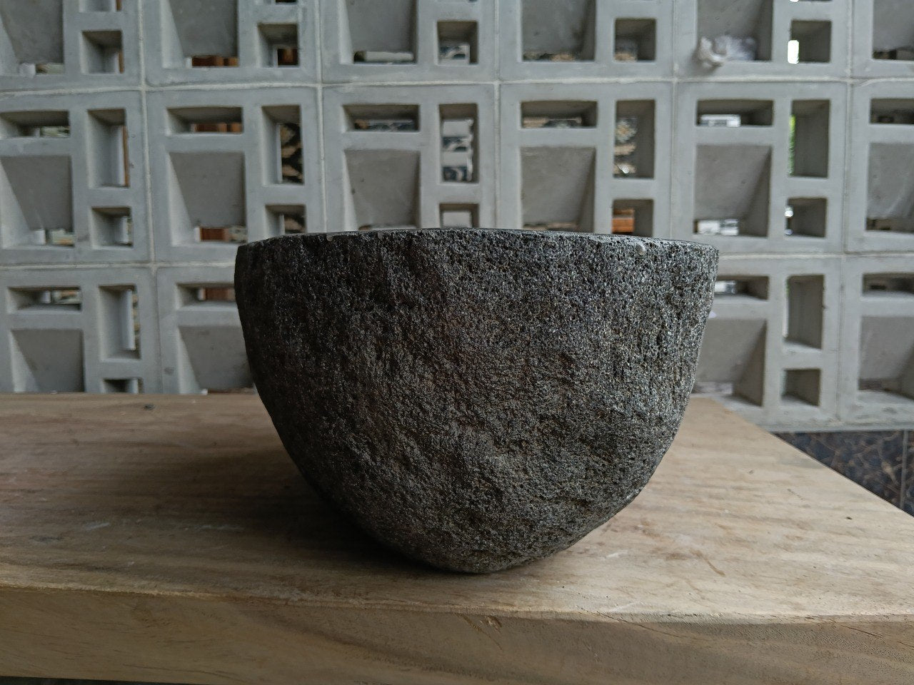 Left side of 6761-4029 river stone vessel sink in gray-brown natural stone
