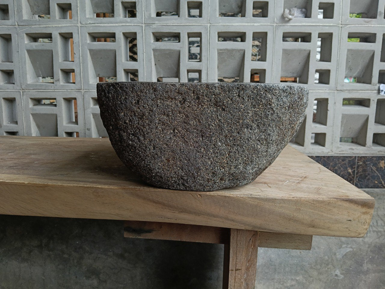 Right side of 6785-4734 organic stone sink, polished bowl and rustic exterior
