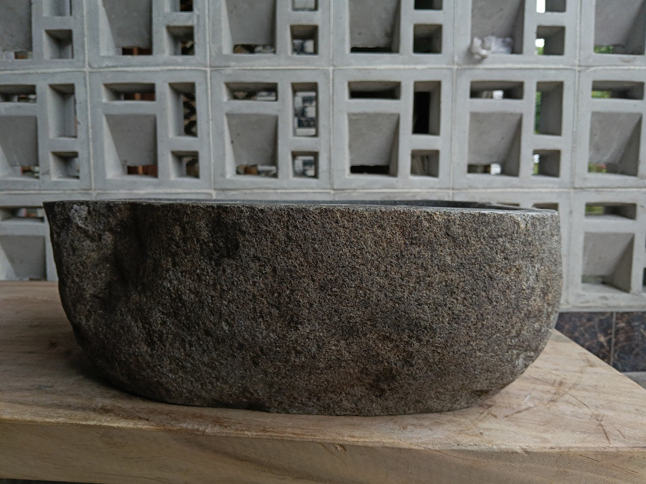 Right side of 6876-4538 organic triangular stone sink, polished bowl
