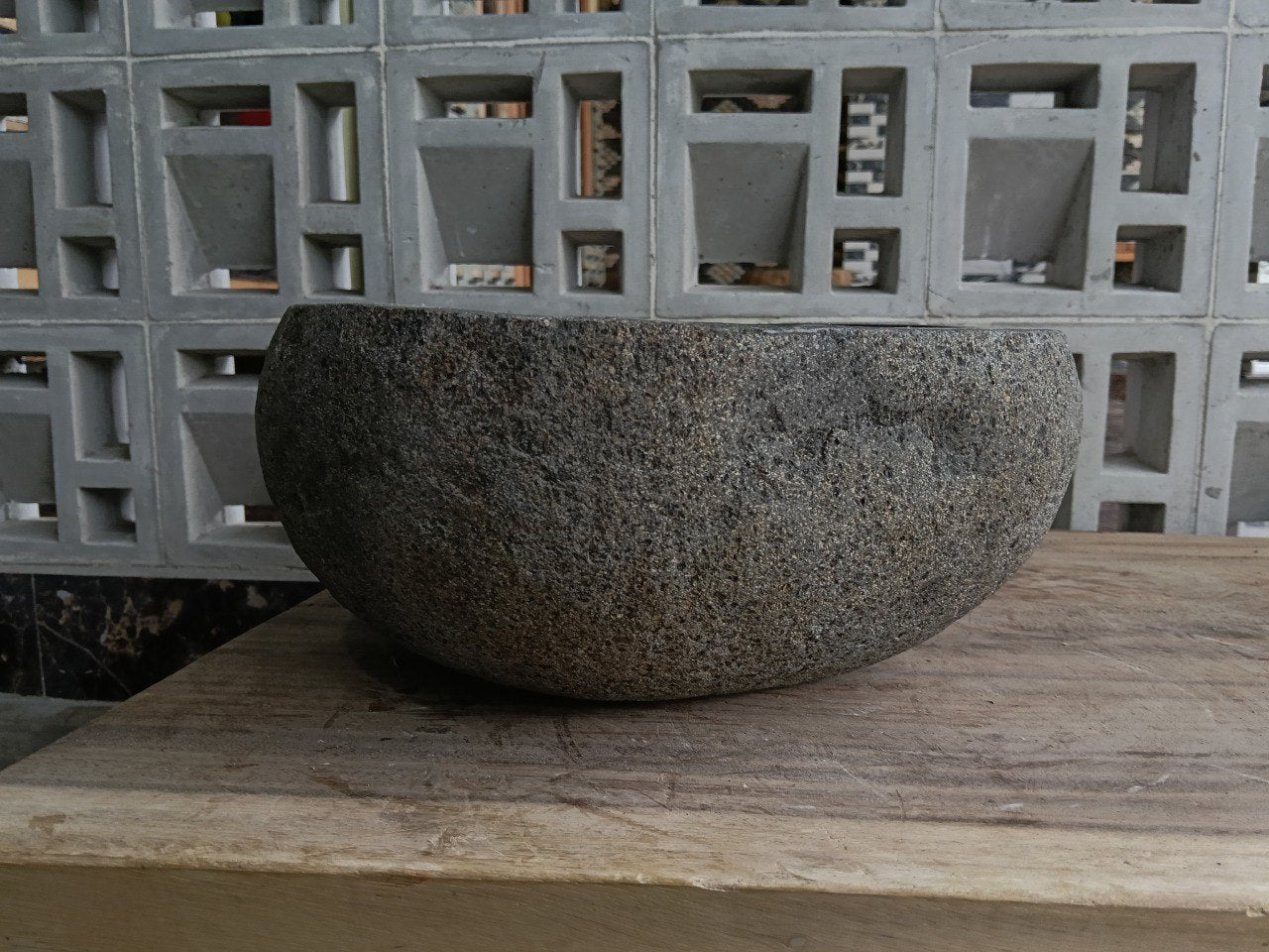 Left side of 6881-4031 river stone vessel sink in dark graphite color
