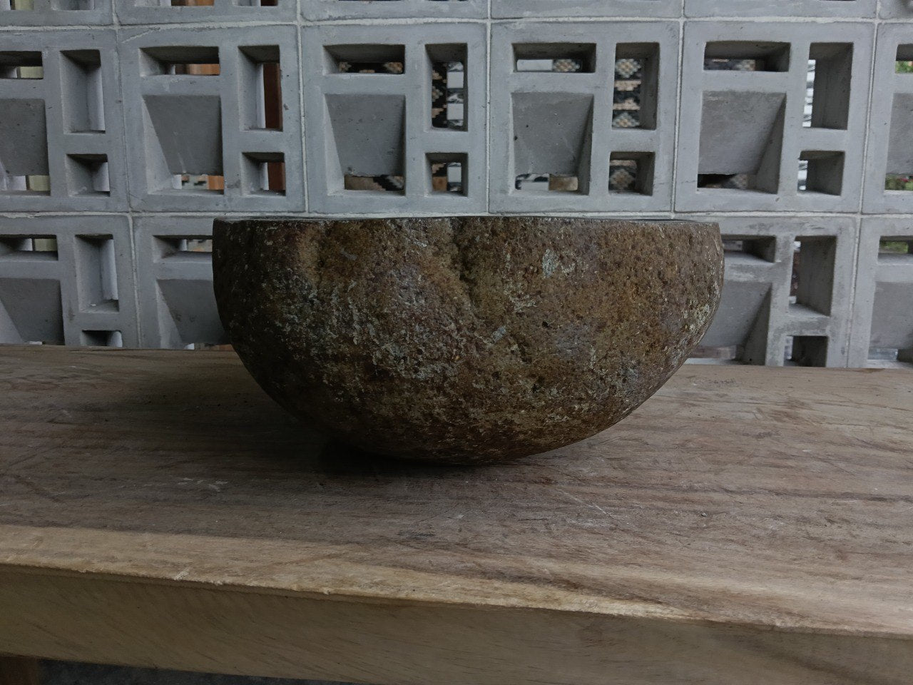 Left side of 6885-4133 river stone vessel sink in olive graphite color
