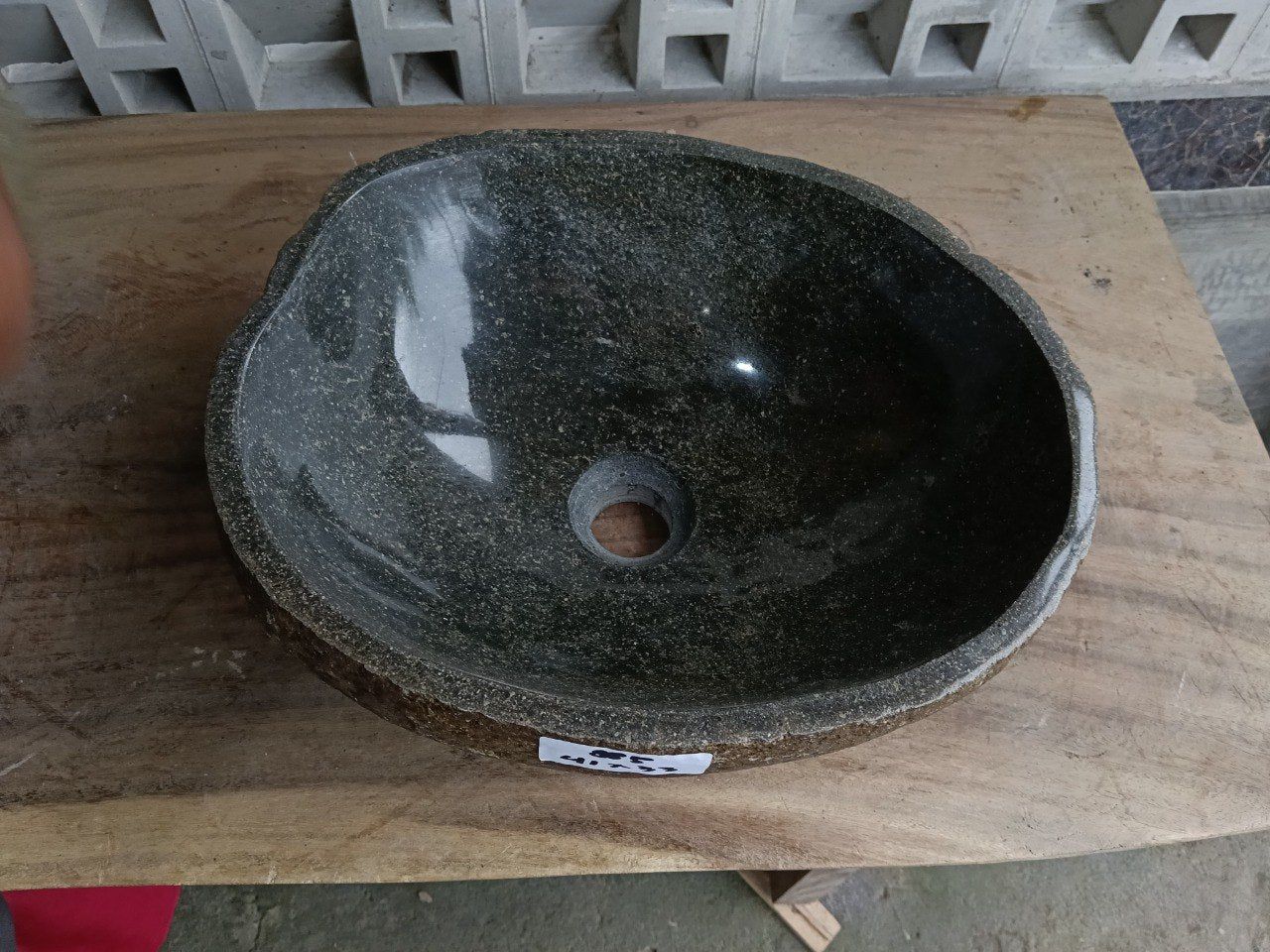 Top view of 6885-4133 dark olive river stone sink, polished oval interior
