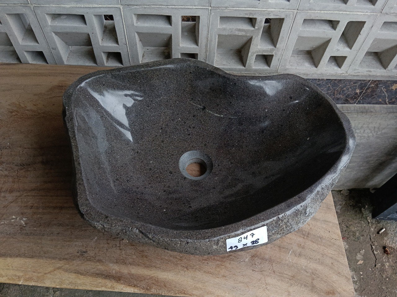 Top view of 6847-4938 deep graphite river stone sink, polished wave-oval interior
