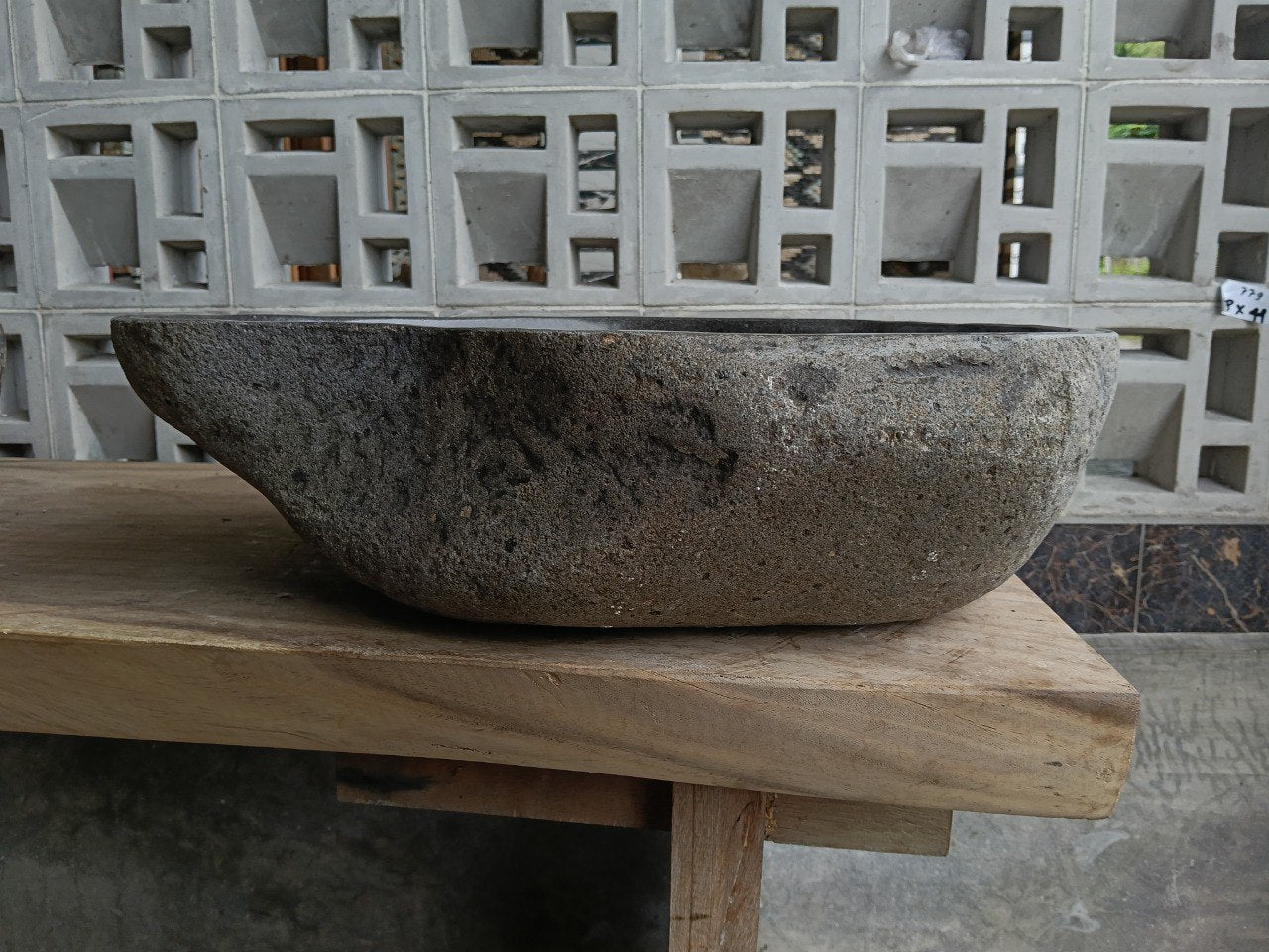Back view of 6847-4938 handcrafted stone bathroom basin with raw exterior texture
