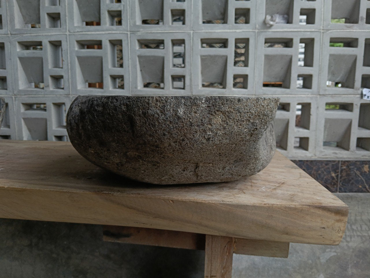 Right side of 6847-4938 natural stone sink, polished bowl and rustic rock surface
