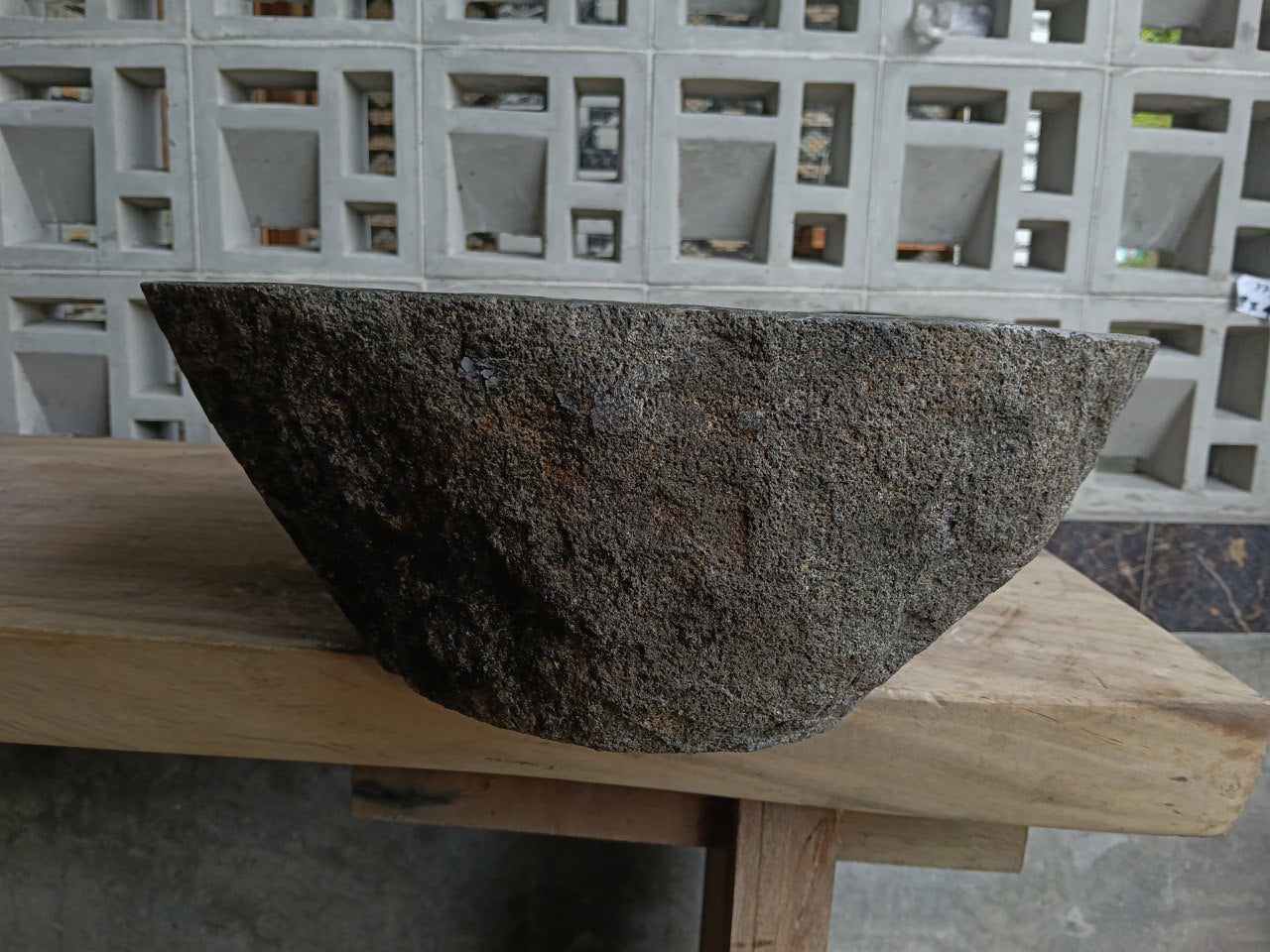 Right side of 6857-4736 natural stone sink, polished bowl and rustic rock surface

