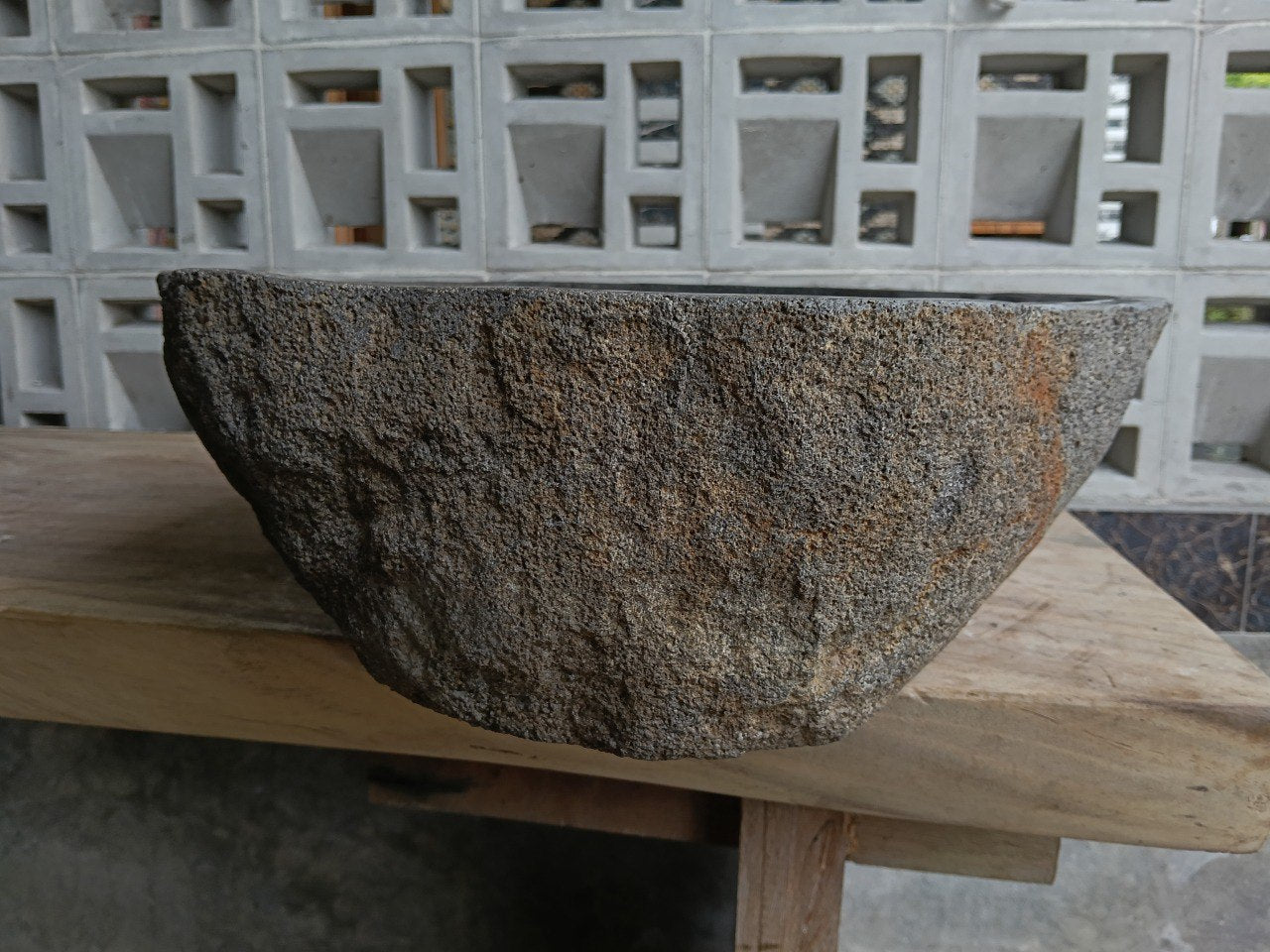 Left side of 6857-4736 river stone vessel sink in dark graphite color
