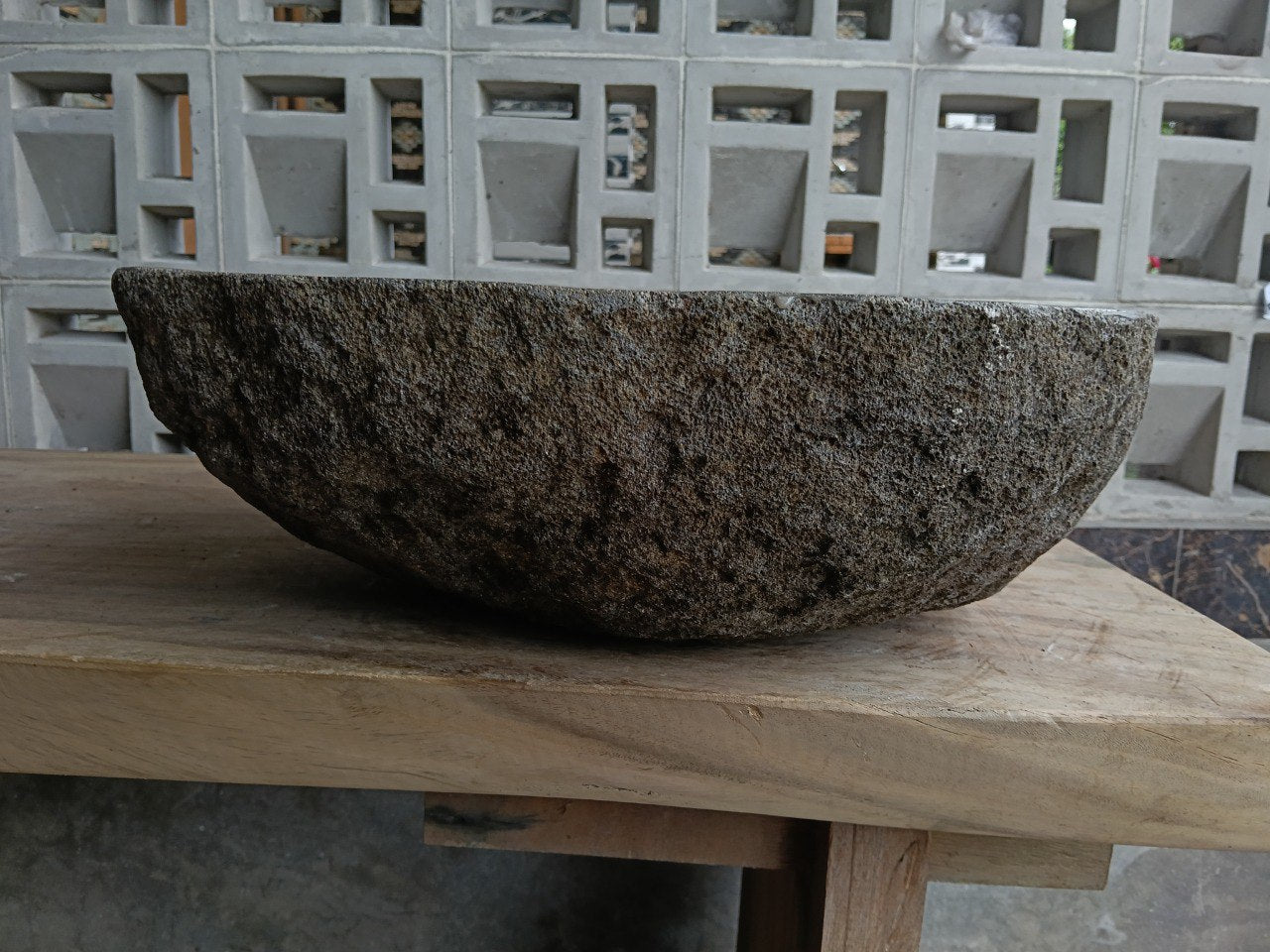 Back view of 6858-4642 handcrafted stone bathroom basin with raw exterior texture
