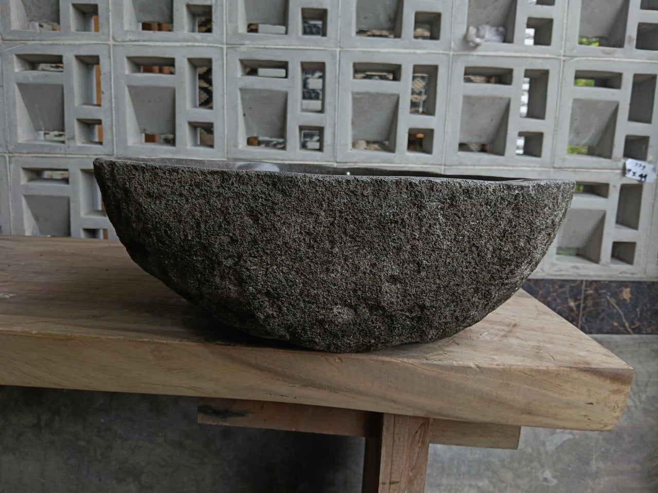 Left side of 6858-4642 natural stone vessel sink in deep gray color
