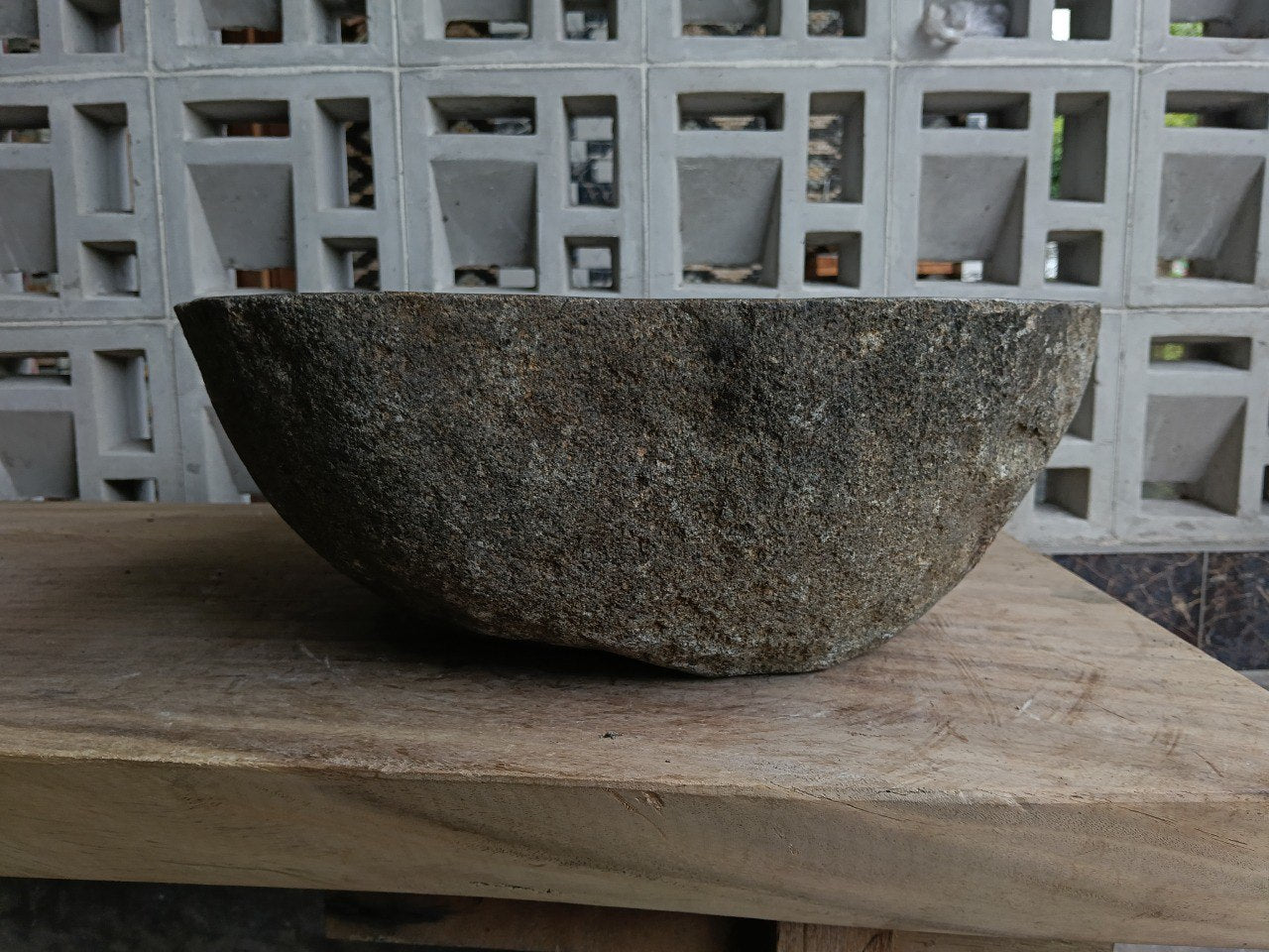 Left side of 6859-4543 natural stone vessel sink in warm gray color
