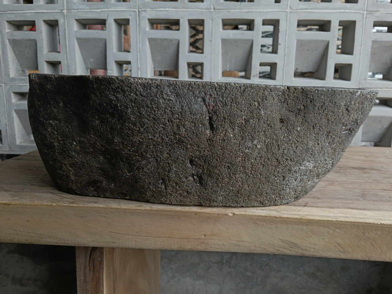 Back view of 6821-4934 handcrafted stone bathroom basin with raw exterior texture
