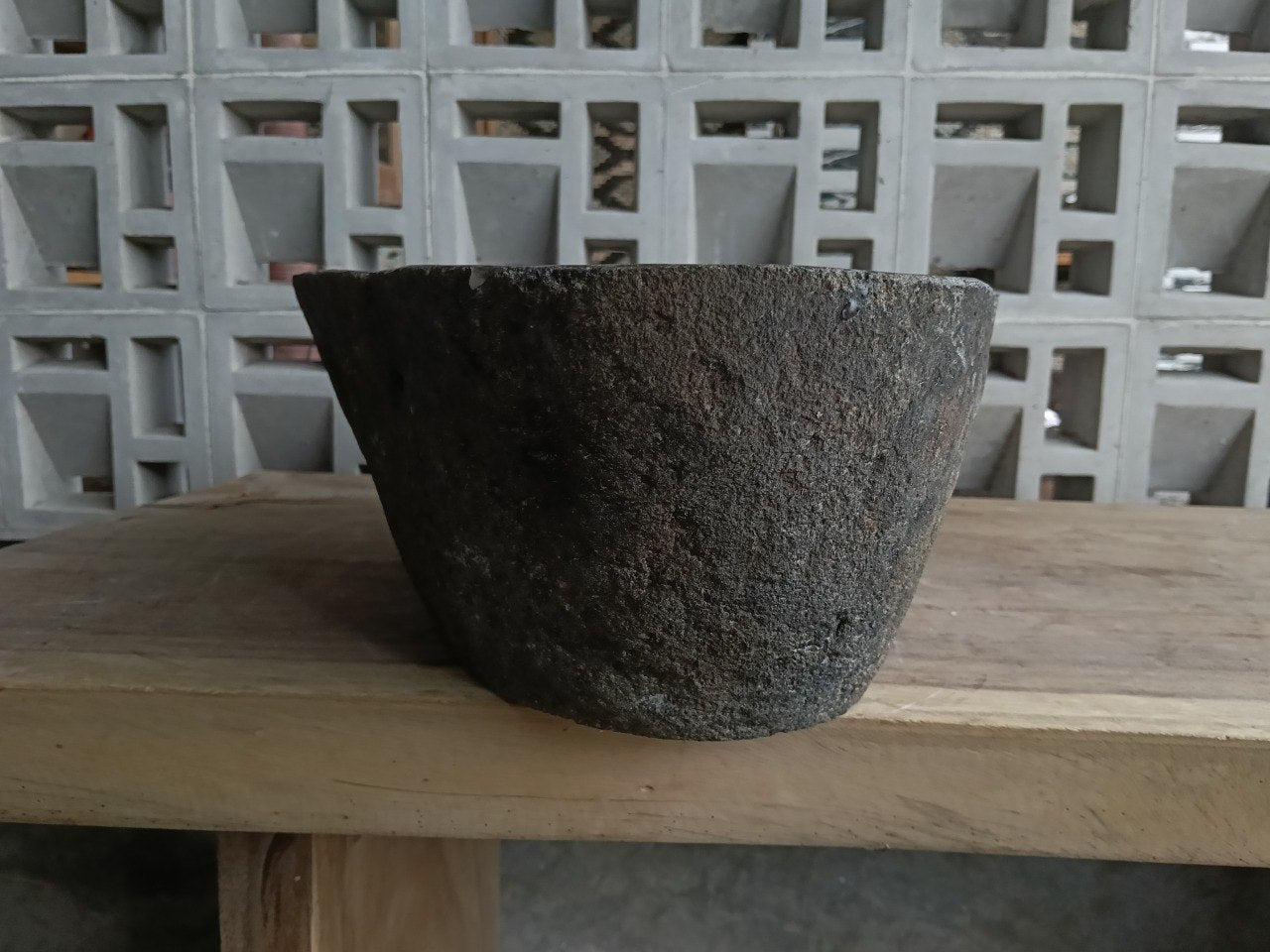 Left side of 6821-4934 river stone vessel sink in dark graphite gray color
