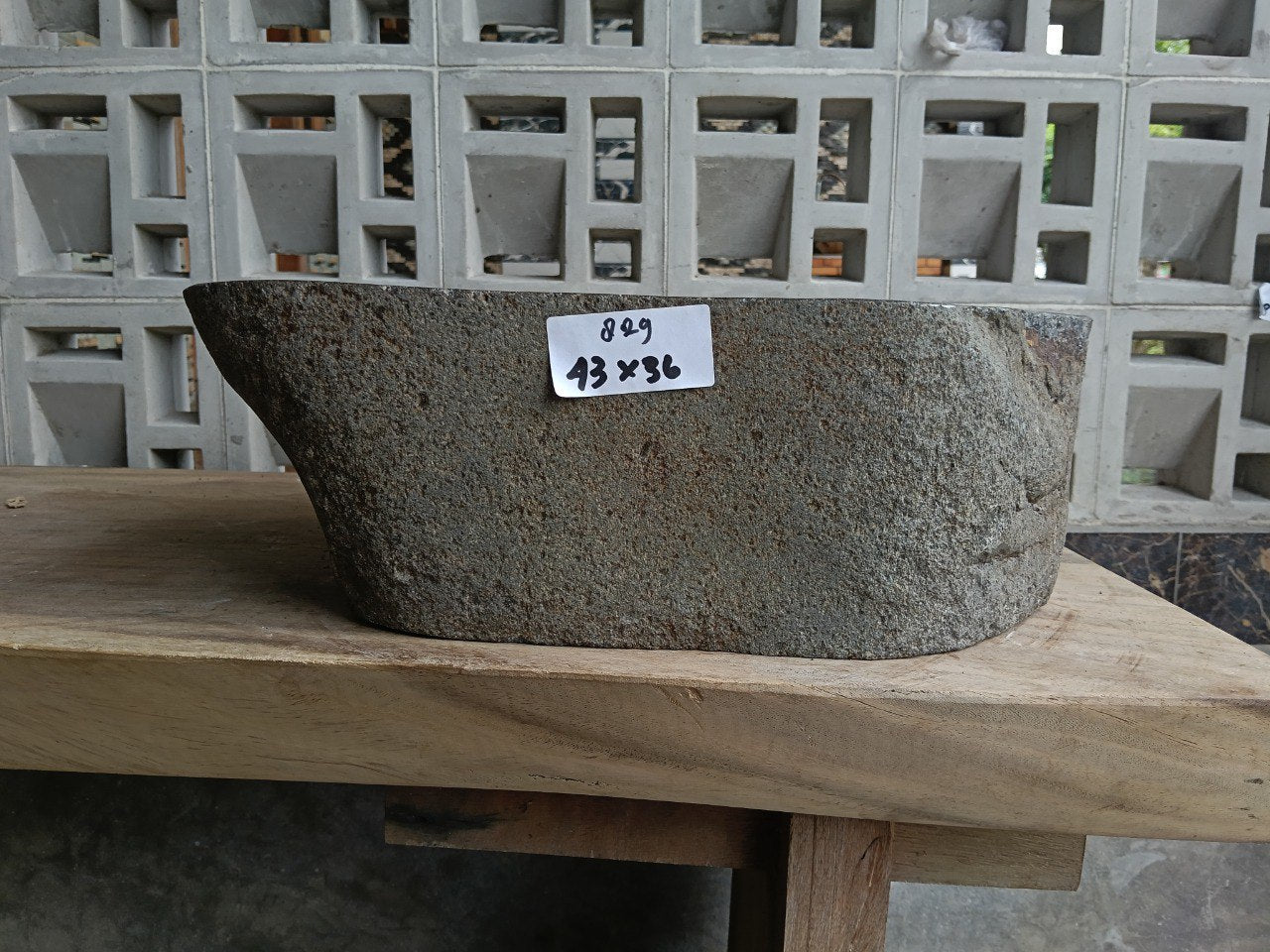 Front view of 6829-4336 natural river rock vessel sink, organic triangular oval shape
