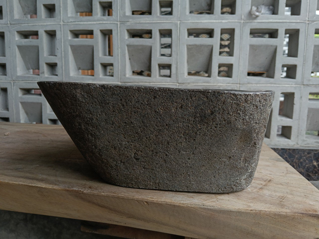 Left side of 6829-4336 dark natural stone sink with polished bowl
