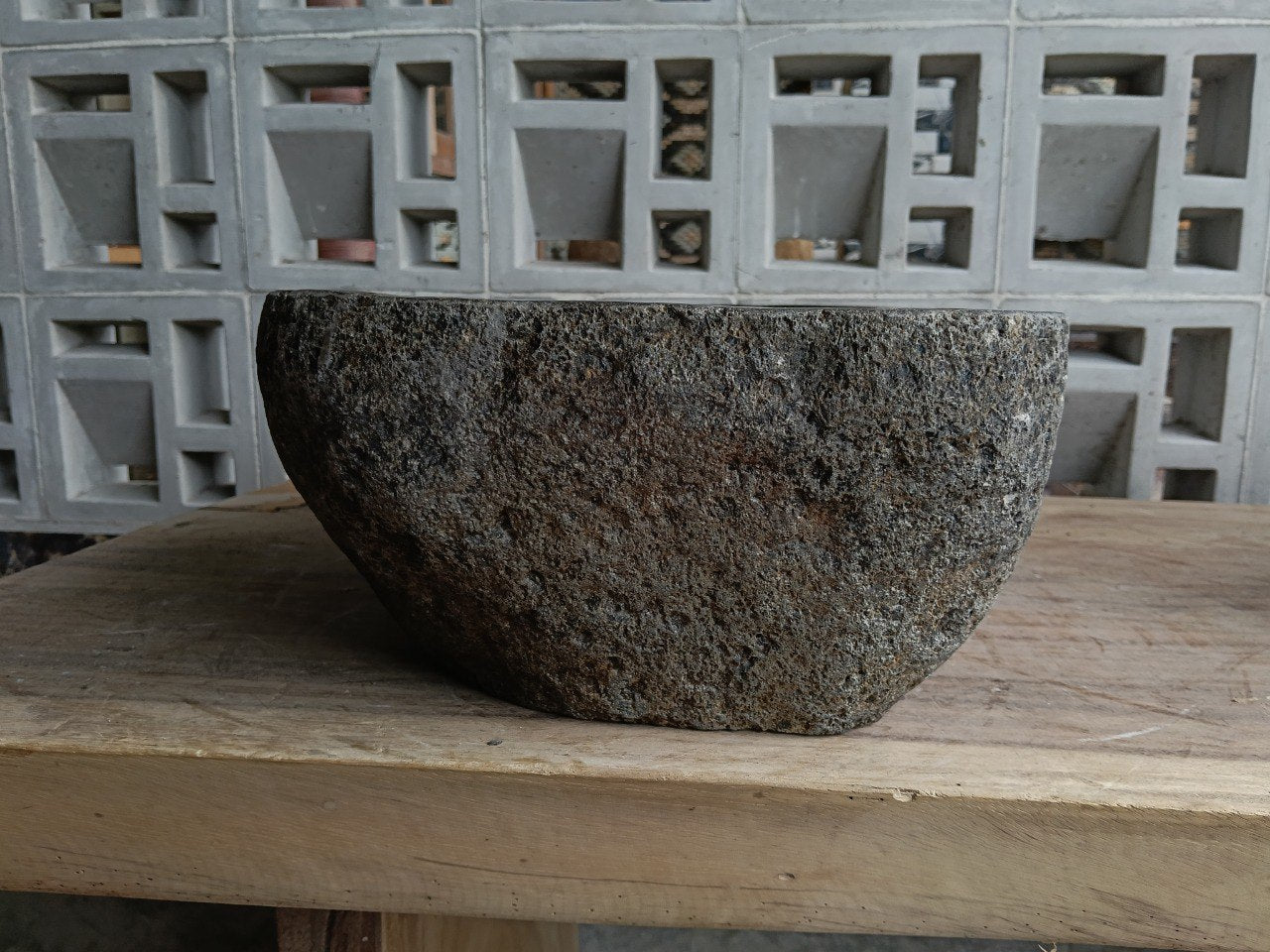 Right side of 6835-4132 natural stone vessel sink, deep graphite interior
