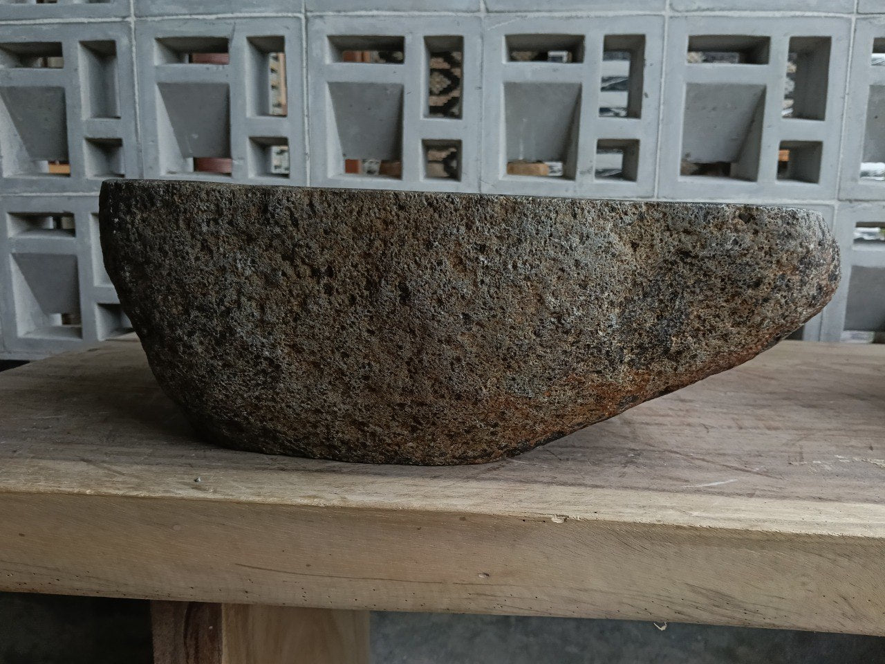 Back view of 6835-4132 handcrafted river rock bathroom basin, raw exterior
