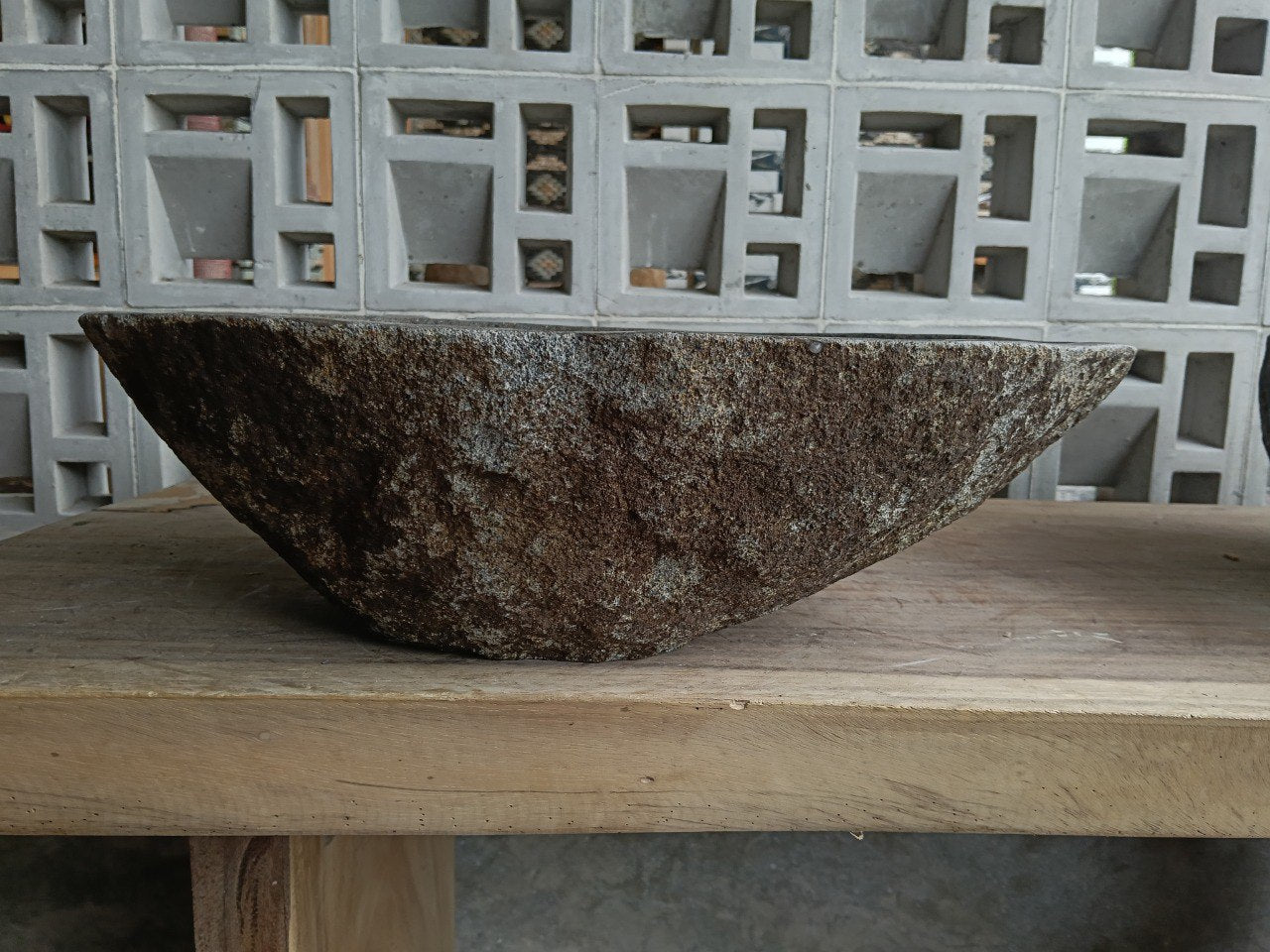 Back view of 6844-4836 handcrafted stone bathroom basin with raw exterior texture
