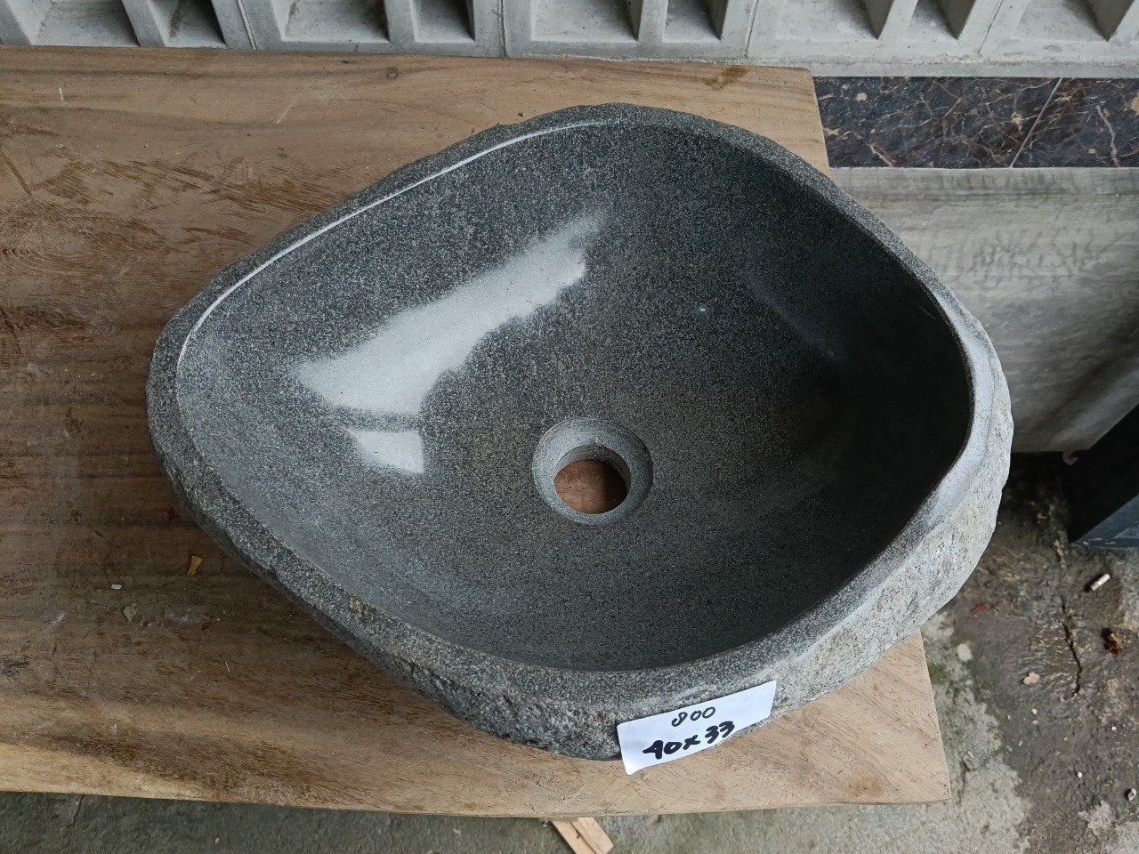 Top view of 6800-4033 dark gray river stone sink with polished interior
