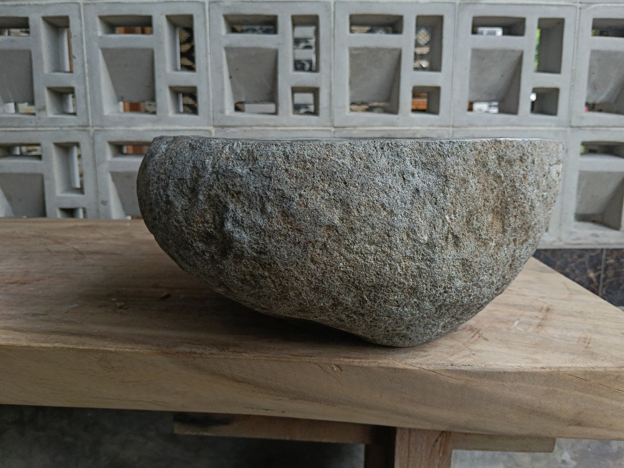 Left side of 6800-4033 river stone vessel sink in dark graphite color
