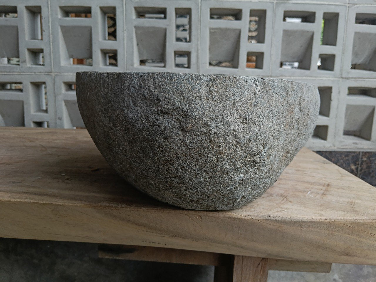 Right side of 6800-4033 natural stone sink, polished bowl and rustic outer surface
