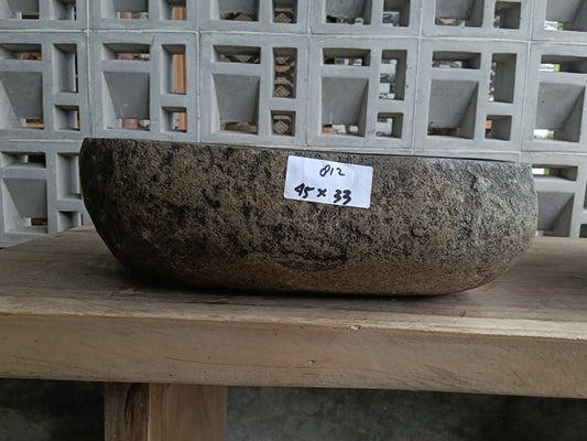 Front view of 6812-4533 river stone vessel — polished interior bowl

