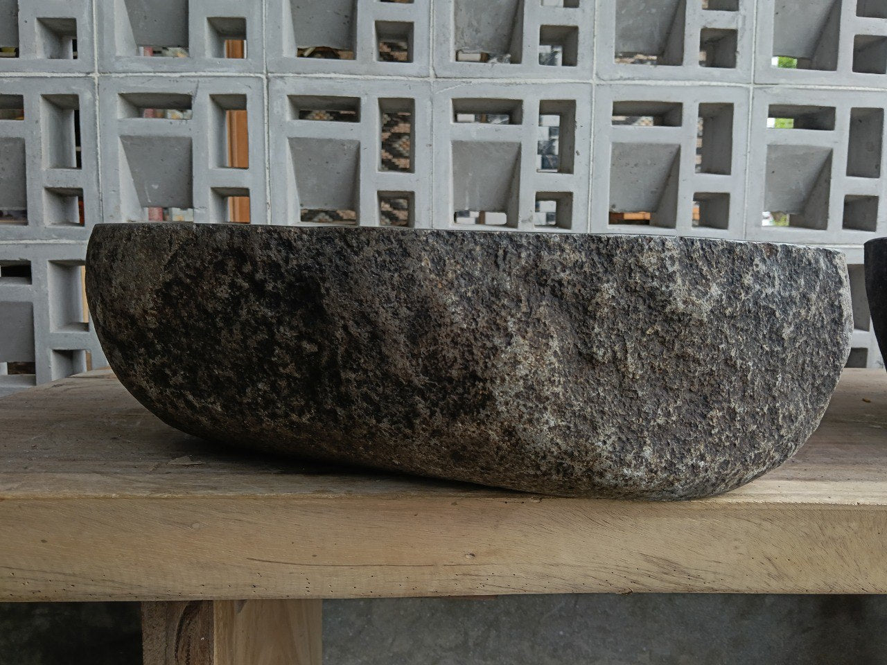 Back view of 6812-4533 natural river stone basin — textured exterior surface
