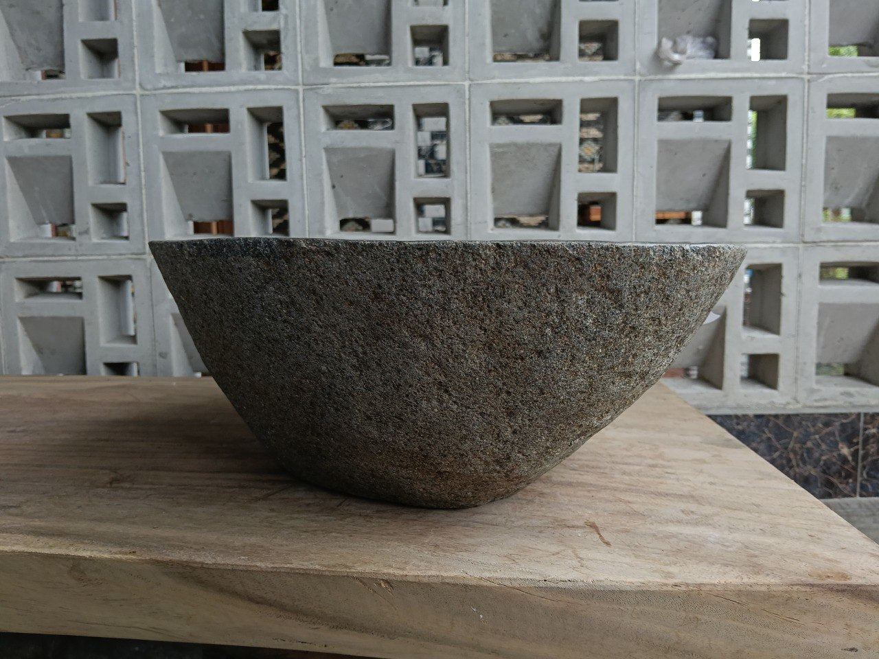 Right side of 6685-4939 handcrafted river stone vessel — natural textured exterior
