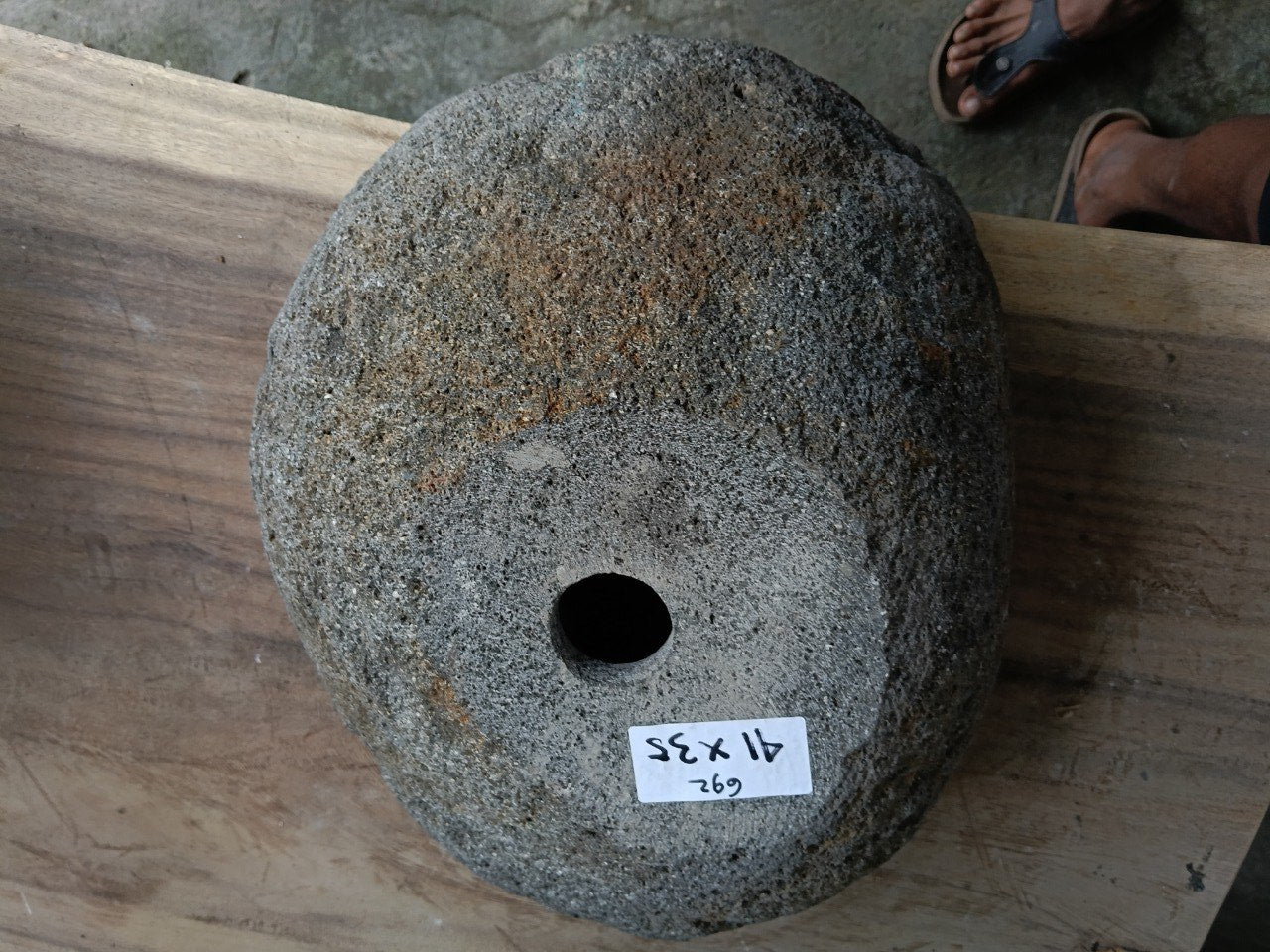 Bottom view of 6692-4135 solid river stone sink — standard drain hole
