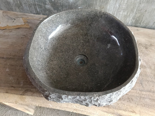 Top view of A150-4846 dark brown–taupe marble sink with polished interior and rough natural exterior, organic round-oval shape.
