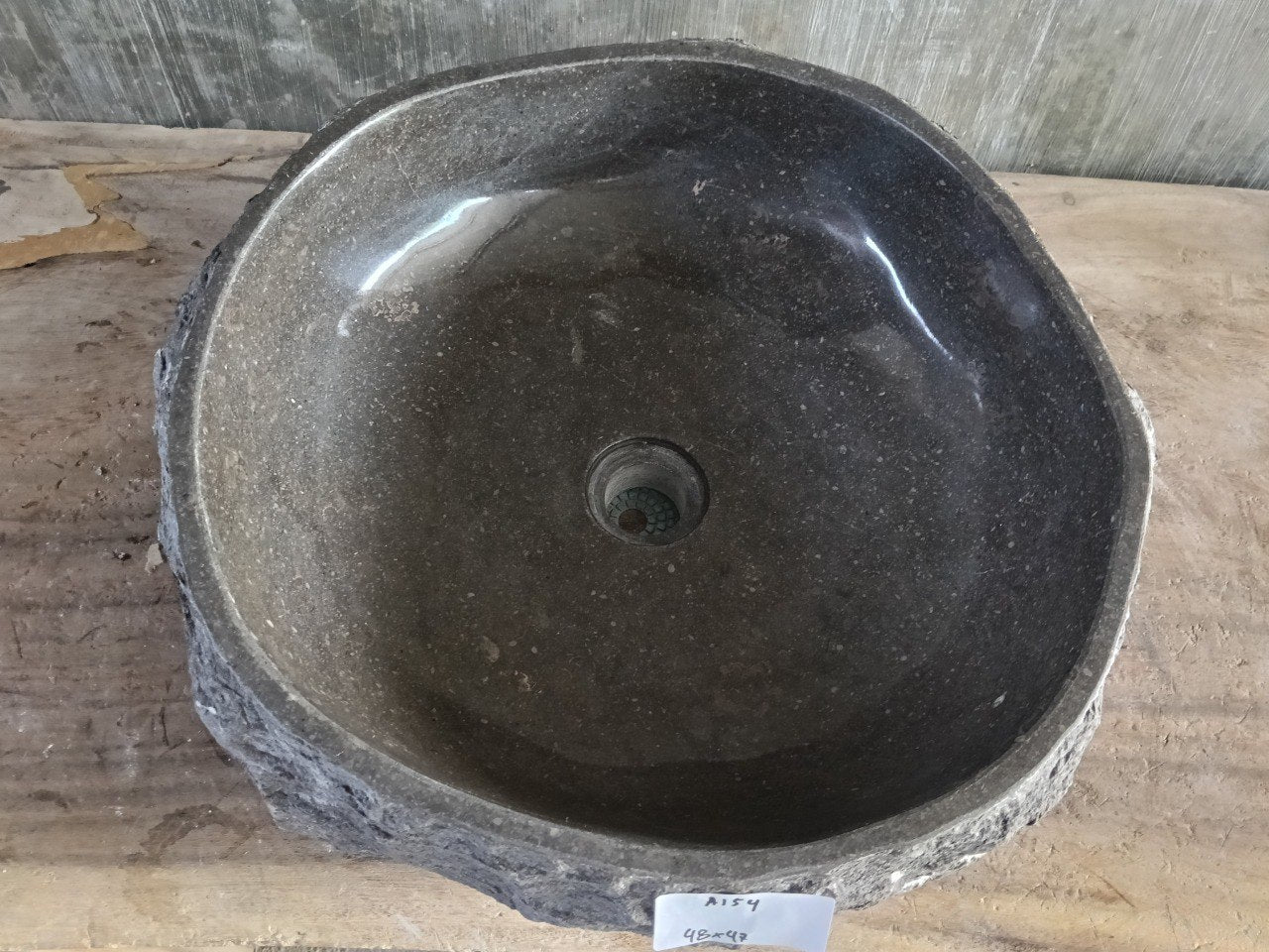 Top view of A154-4847 brown–taupe marble sink with polished interior and rough natural exterior, organic oval round shape.
