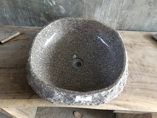 Top view of A155-5050 brown–gray marble sink with polished interior and rough natural exterior, organic round shape.
