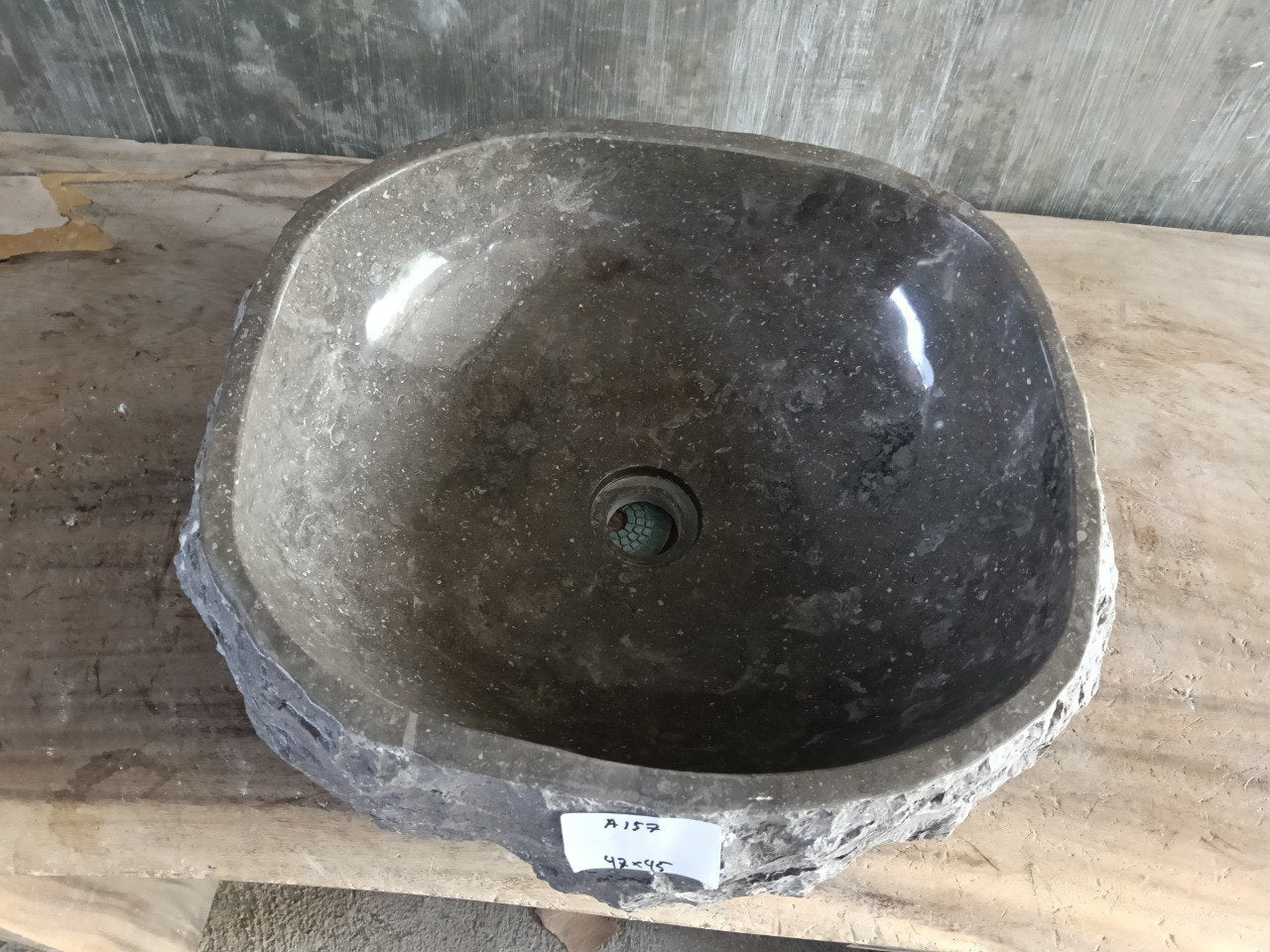 Top view of A157-4745 brown–taupe marble sink with polished interior and rough natural exterior, organic square-oval shape.
