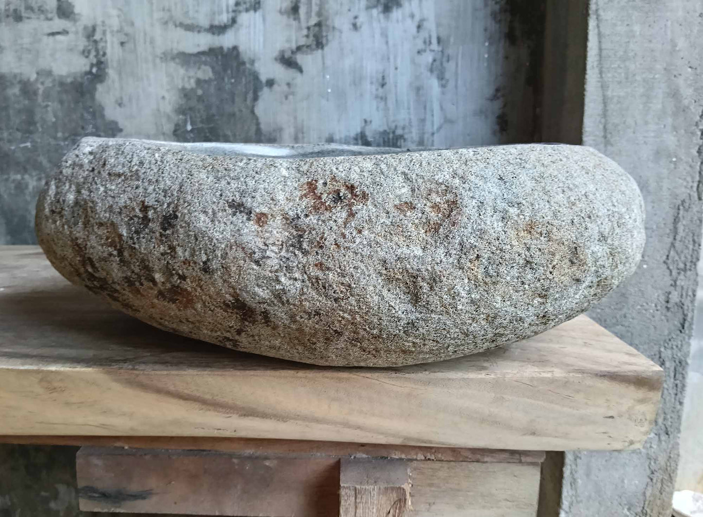 Back side of natural river stone sink showing rugged stone texture and gentle curves – SKU 6529-1815
