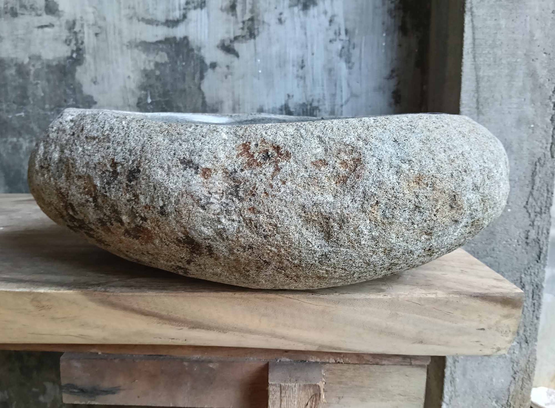 Back side of natural river stone sink showing rugged stone texture and gentle curves – SKU 6529-1815
