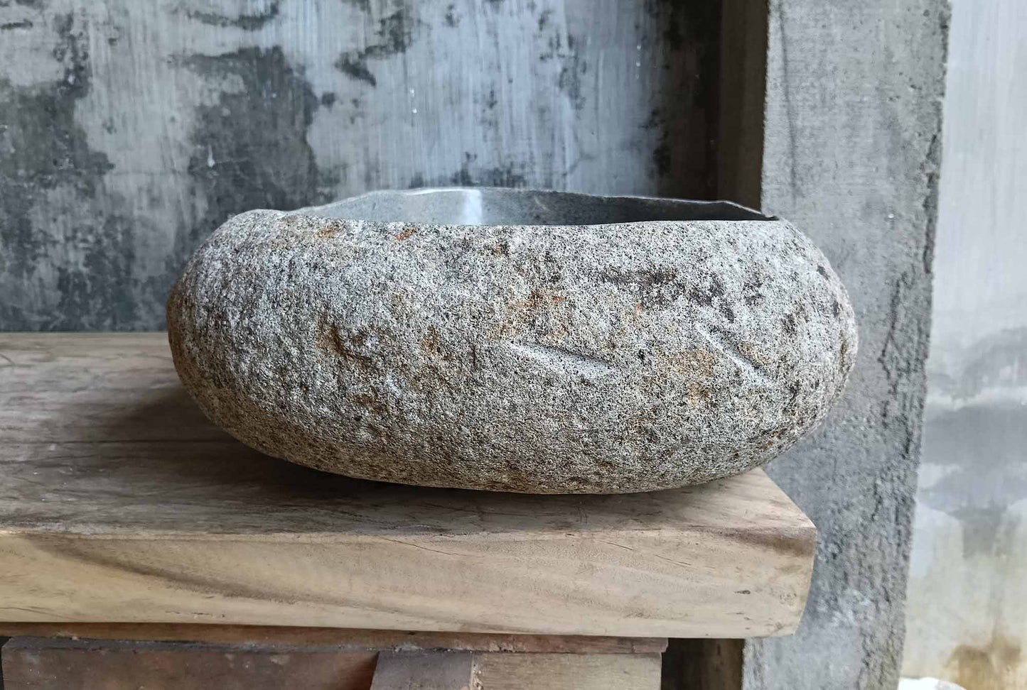 Left side of oval gray river stone sink highlighting uneven outer texture and organic shape – SKU 6529-1815
