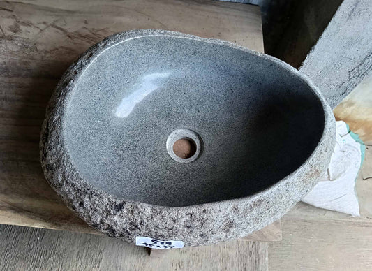 Top view of river stone sink with light gray polished interior and asymmetrical oval shape – SKU 6529-1815
