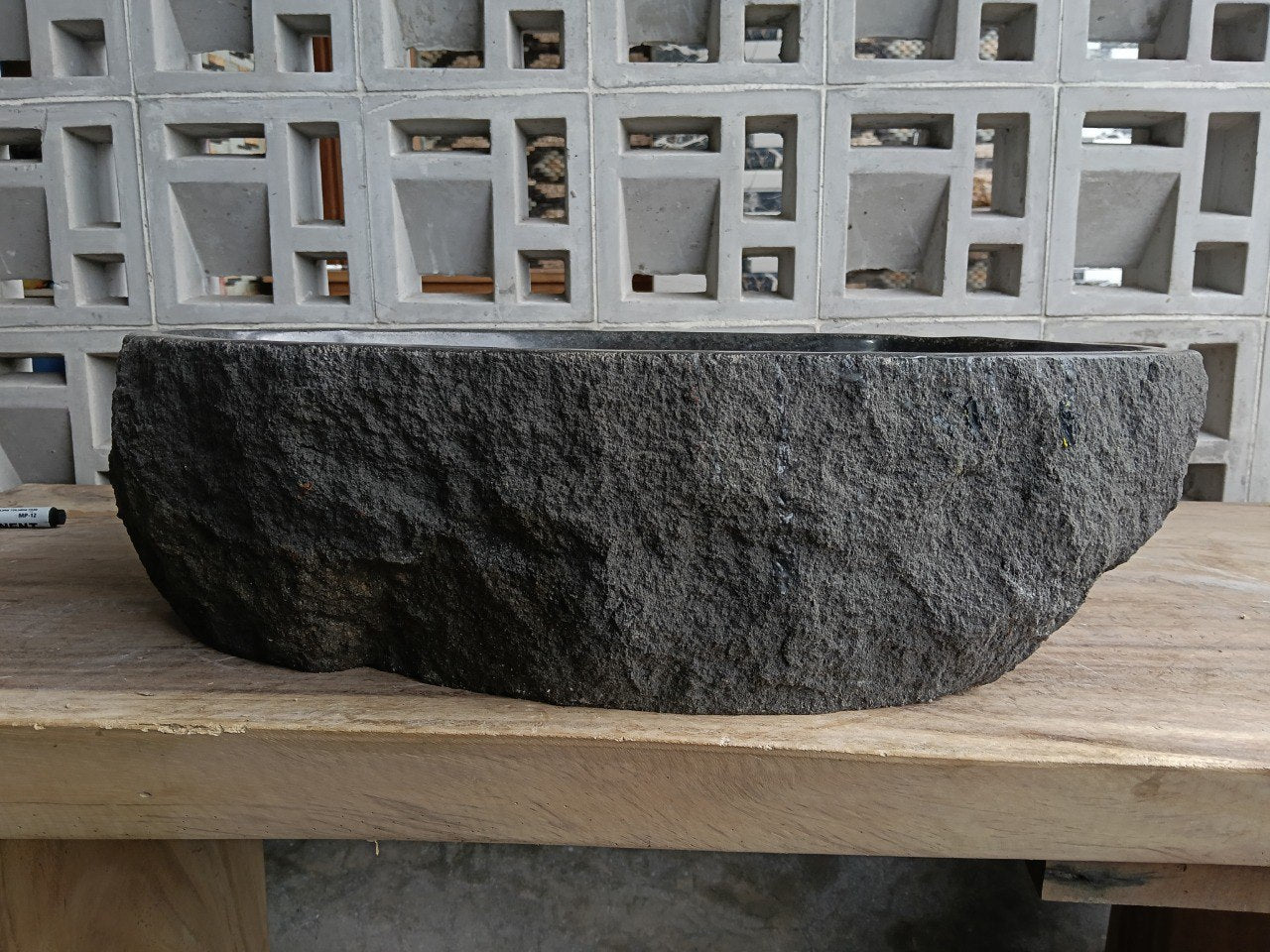 Front view of handcrafted oval andesite bathroom sink
