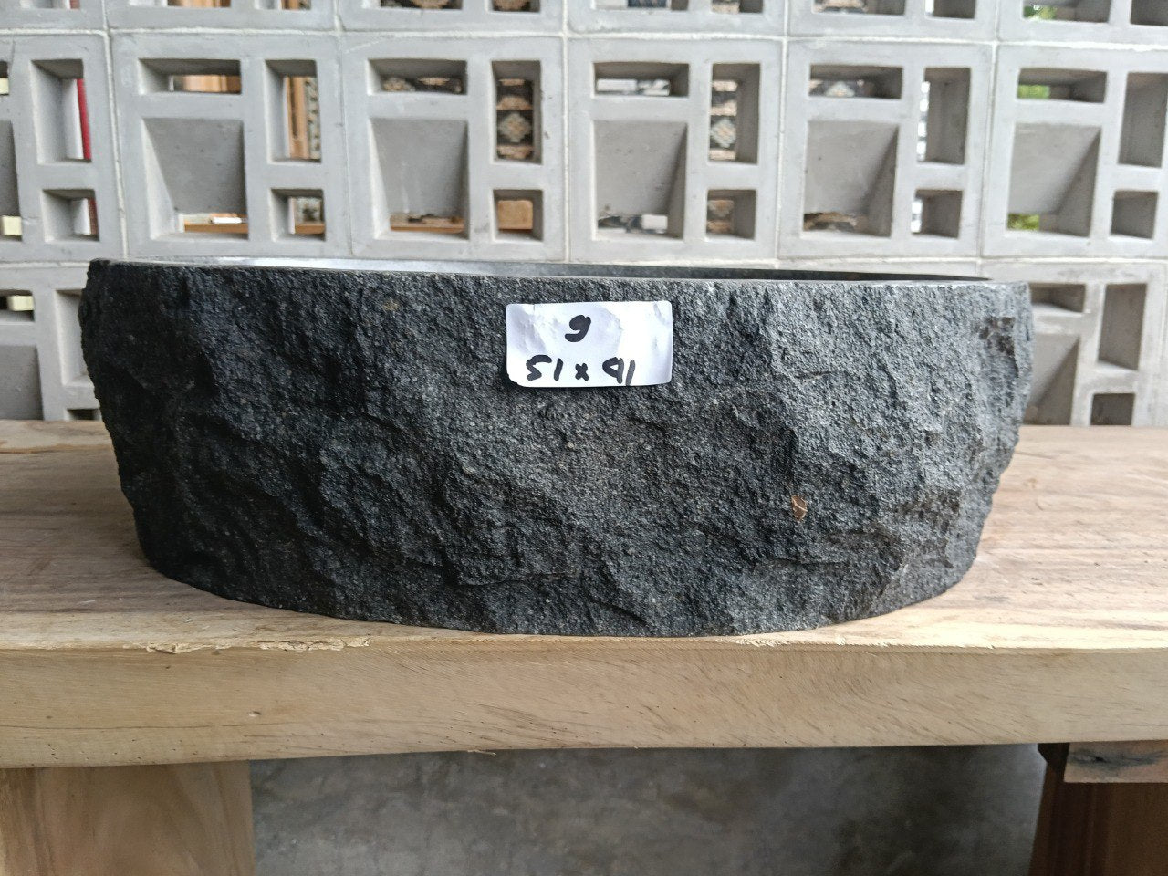 Front view of handcrafted oval andesite bathroom sink

