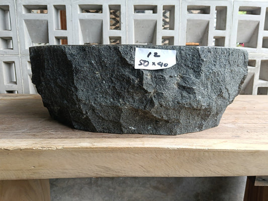 Front view of handcrafted oval andesite bathroom sink
