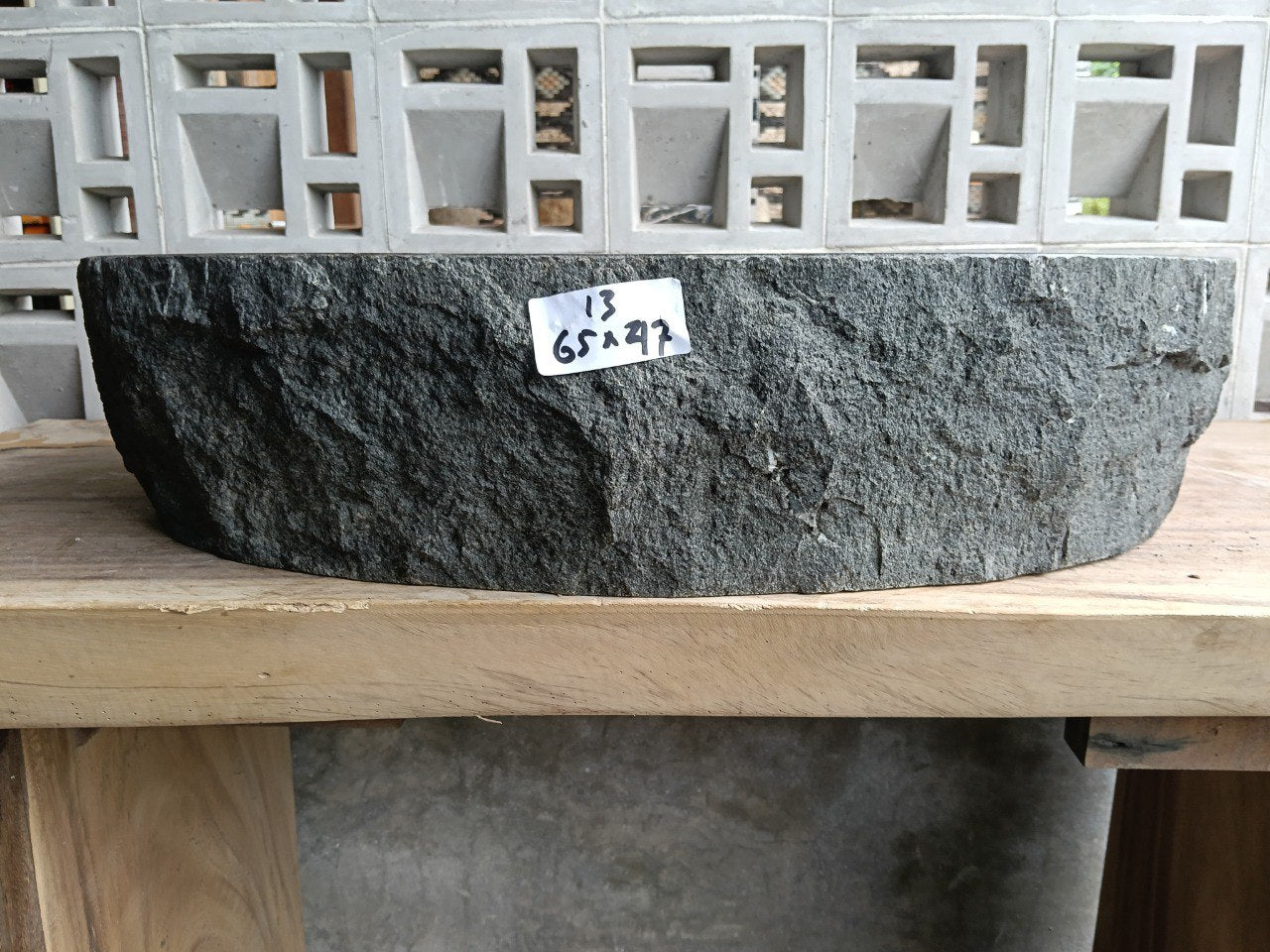 Front view of handcrafted oval andesite bathroom sink
