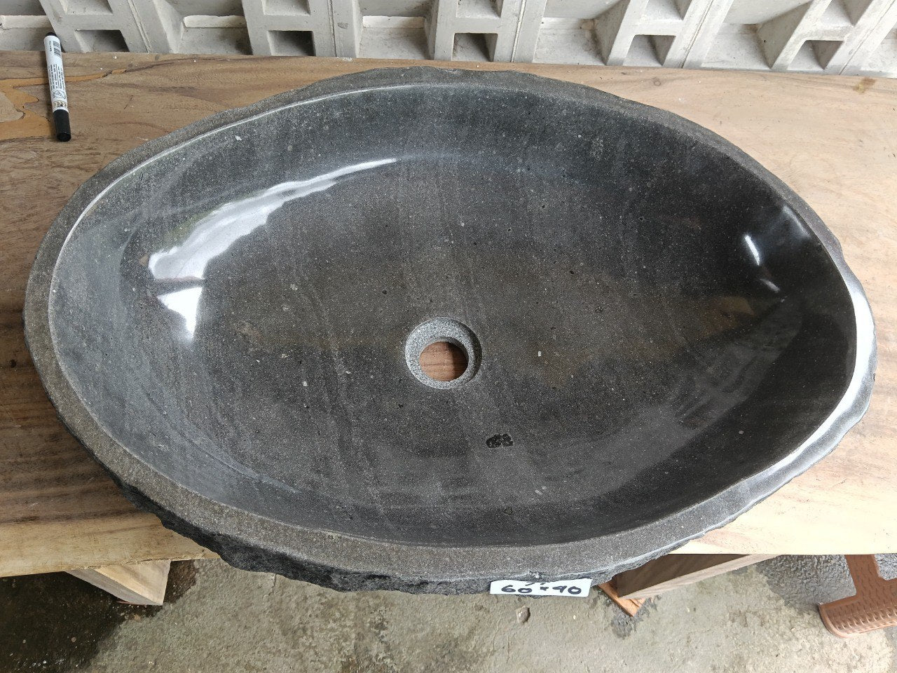 Top view of elongated oval dark gray andesite stone sink ndz6037-6040
