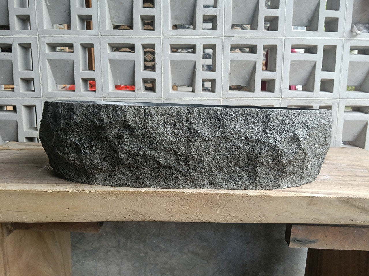 Right side perspective of handcrafted dark gray andesite sink
