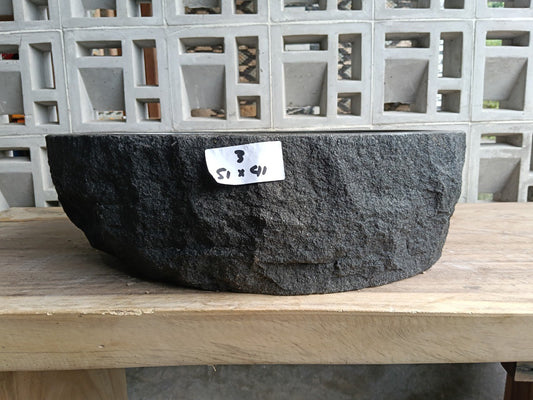 Front view of handcrafted oval andesite bathroom sink
