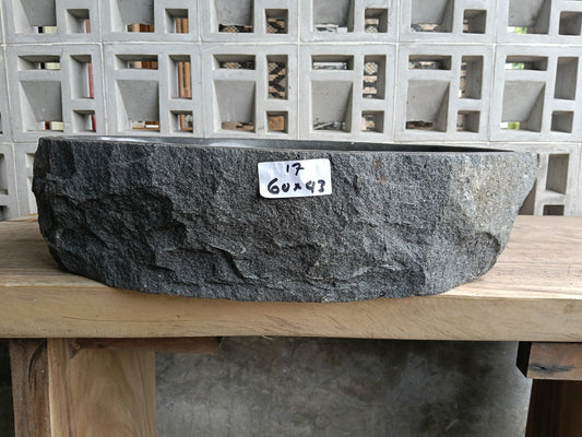 Front view of handcrafted oval andesite bathroom sink
